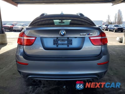 Zdjęcie 6 z 11 samochodu: 2011 BMW X6 M VIN:5YMGZ0C50BLK13891 - miniatura
