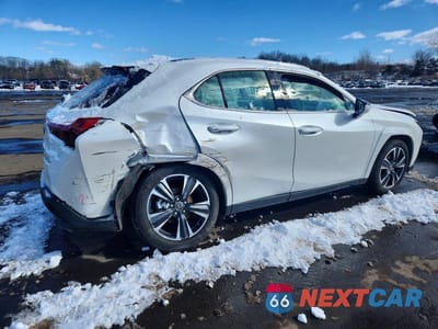 Trzecie zdjęcie samochodu z tyłu: 2025 LEXUS UX 300H BASE VIN:JTHUCJDH4S2007084 - miniatura