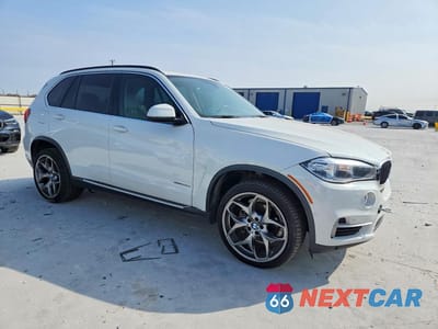 Czwarte zdjęcie samochodu z boku: 2014 BMW X5 XDRIVE35D VIN:5UXKS4C52E0J94599 - miniatura