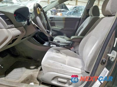 Zdjęcie 7 z 11 samochodu: 2003 TOYOTA CAMRY LE VIN:4T1BF32K53U548219 - miniatura