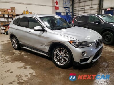 Czwarte zdjęcie samochodu z boku: 2018 BMW X1 XDRIVE28I VIN:WBXHT3C37J5F89785 - miniatura