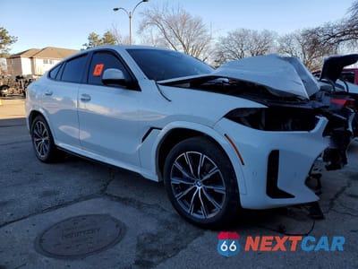 Czwarte zdjęcie samochodu z boku: 2026 BMW X6 XDRIVE40I VIN:5UX33EX08T9277372 - miniatura