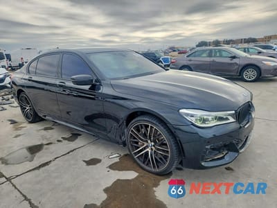 Czwarte zdjęcie samochodu z boku: 2018 BMW 750 XI VIN:WBA7F2C59JG424458 - miniatura