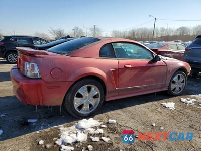 Trzecie zdjęcie samochodu z tyłu: 2002 FORD MUSTANG VIN:1FAFP40462F207613 - miniatura