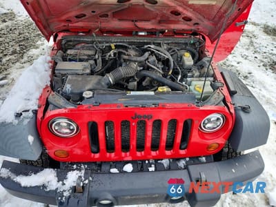 Zdjęcie 12 z 13 samochodu: 2011 JEEP WRANGLER VIN:1J4AA2D11BL503824 - miniatura