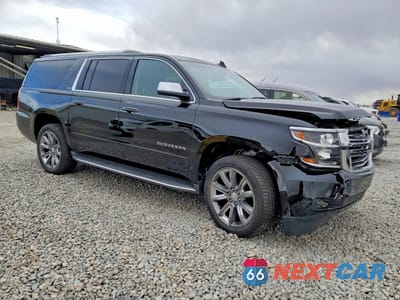 Czwarte zdjęcie samochodu z boku: 2016 CHEVROLET SUBURBAN K1500 LTZ VIN:1GNSKJKC0GR329200 - miniatura