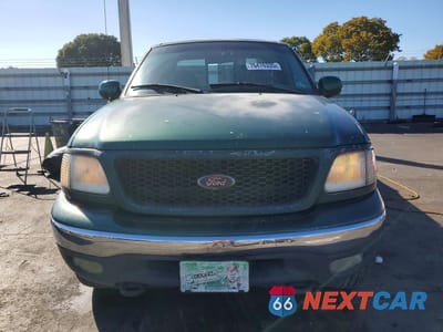 Piąte zdjęcie samochodu w środku: 2000 FORD F150 VIN:1FTRX18LXYNC03208 - miniatura