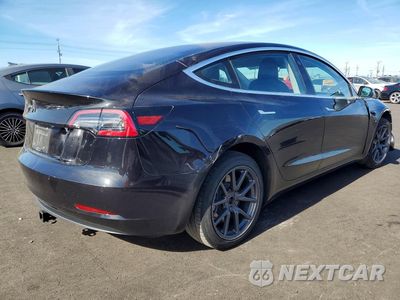 Trzecie zdjęcie samochodu z tyłu: 2018 TESLA MODEL 3 VIN:5YJ3E1EA0JF070364 - miniatura