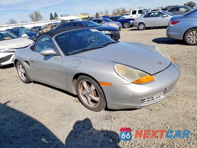 Czwarte zdjęcie samochodu z boku: 1999 PORSCHE BOXSTER VIN:WP0CA2985XU623776 - miniatura