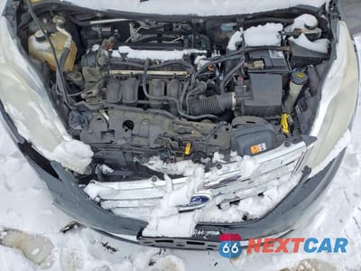 Zdjęcie 11 z 12 samochodu: 2013 FORD FIESTA TITANIUM VIN:3FADP4CJ2DM180969 - miniatura