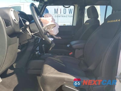 Zdjęcie 7 z 11 samochodu: 2015 JEEP WRANGLER UNLIMITED SAHARA VIN:1C4BJWEG9FL718118 - miniatura