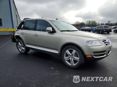Czwarte zdjęcie samochodu z boku: 2004 VOLKSWAGEN TOUAREG TDI 5.0 VIN:WVGHH77L84D082350 - miniatura