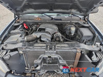 Zdjęcie 11 z 11 samochodu: 2010 CHEVROLET SILVERADO K1500 LS VIN:1GCSKREA4AZ277451 - miniatura