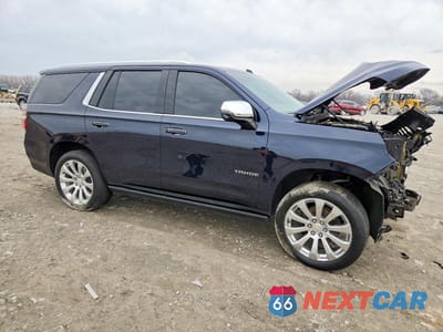 Czwarte zdjęcie samochodu z boku: 2021 CHEVROLET TAHOE K1500 PREMIER VIN:1GNSKSKTXMR348581 - miniatura