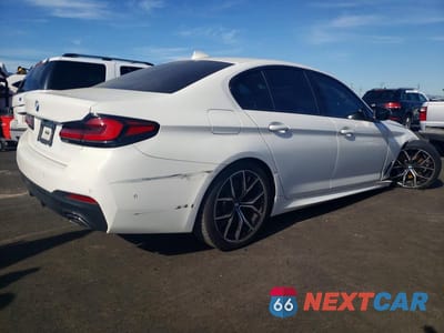 Trzecie zdjęcie samochodu z tyłu: 2021 BMW 530E VIN:WBA13AG06MCF92046 - miniatura