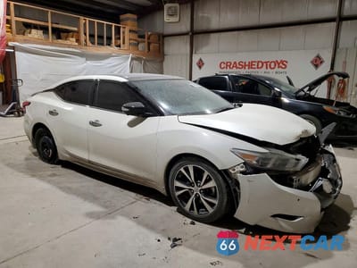 Czwarte zdjęcie samochodu z boku: 2018 NISSAN MAXIMA PLATINUM VIN:1N4AA6AP4JC390848 - miniatura