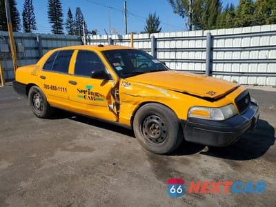 Czwarte zdjęcie samochodu z boku: 2011 FORD CROWN VICTORIA POLICE INTERCEPTOR VIN:2FABP7BV8BX159428 - miniatura