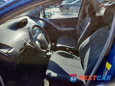 Zdjęcie 7 z 11 samochodu: 2011 TOYOTA YARIS BASE VIN:JTDKT4K30B5331925 - miniatura