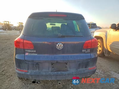 Zdjęcie 6 z 11 samochodu: 2013 VOLKSWAGEN TIGUAN S VIN:WVGBV7AX0DW519286 - miniatura