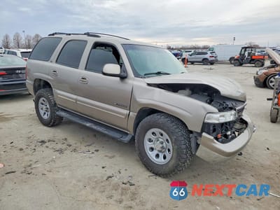 Czwarte zdjęcie samochodu z boku: 2001 CHEVROLET TAHOE K1500 VIN:1GNEK13T61J122831 - miniatura