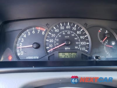 Zdjęcie 9 z 11 samochodu: 2003 TOYOTA COROLLA CE VIN:JTDBR32E330028694 - miniatura