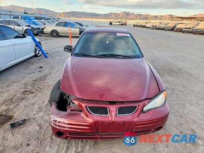 Piąte zdjęcie samochodu w środku: 2000 PONTIAC GRAND AM S VIN:1G2NF52T0YM753366 - miniatura