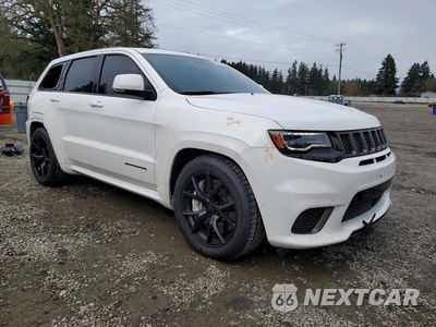 Czwarte zdjęcie samochodu z boku: 2018 JEEP GRAND CHEROKEE TRACKHAWK VIN:1C4RJFN98JC318673 - miniatura