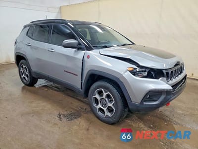 Czwarte zdjęcie samochodu z boku: 2022 JEEP COMPASS TRAILHAWK VIN:3C4NJDDB7NT104582 - miniatura