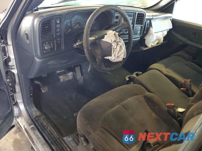 Zdjęcie 8 z 11 samochodu: 2001 CHEVROLET SILVERADO K1500 VIN:1GCEK19T51E117662 - miniatura