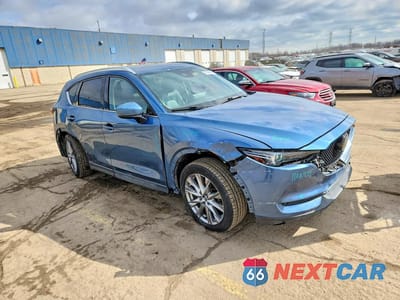 Czwarte zdjęcie samochodu z boku: 2021 MAZDA CX-5 GRAND TOURING VIN:JM3KFBDM2M0462055 - miniatura