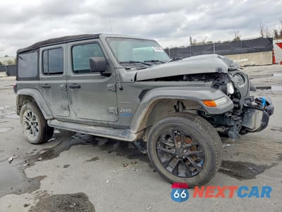 Czwarte zdjęcie samochodu z boku: 2022 JEEP WRANGLER UNLIMITED SAHARA 4XE VIN:1C4JJXP67NW278578 - miniatura