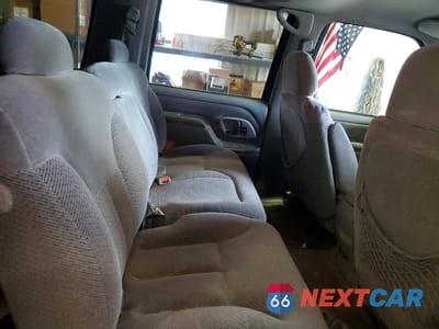 Zdjęcie 10 z 11 samochodu: 1999 CHEVROLET SUBURBAN C1500 VIN:3GNEC16R4XG250623 - miniatura