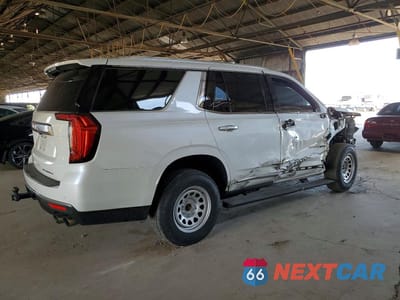 Trzecie zdjęcie samochodu z tyłu: 2022 GMC YUKON DENALI VIN:1GKS2DKL9NR269039 - miniatura