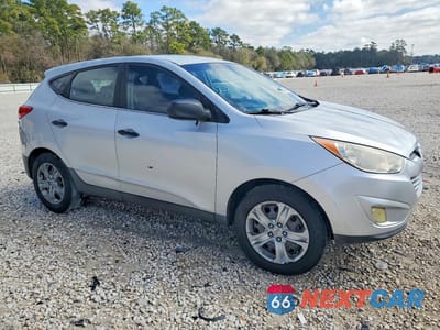 Czwarte zdjęcie samochodu z boku: 2010 HYUNDAI TUCSON GLS VIN:KM8JT3AC8AU010710 - miniatura