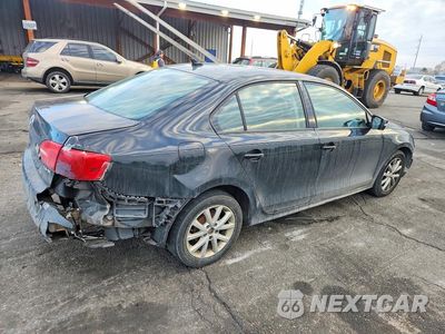 Trzecie zdjęcie samochodu z tyłu: 2012 VOLKSWAGEN JETTA SE VIN:3VWDX7AJ4CM346029 - miniatura