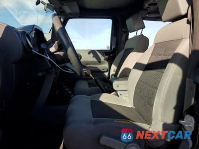Zdjęcie 7 z 13 samochodu: 2010 JEEP WRANGLER SPORT VIN:1J4AA2D13AL154941 - miniatura