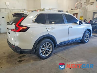 Trzecie zdjęcie samochodu z tyłu: 2024 HONDA CR-V EXL VIN:7FARS4H72RE011059 - miniatura