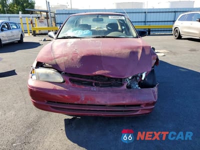 Piąte zdjęcie samochodu w środku: 1999 TOYOTA COROLLA VE VIN:1NXBR12E3XZ217280 - miniatura