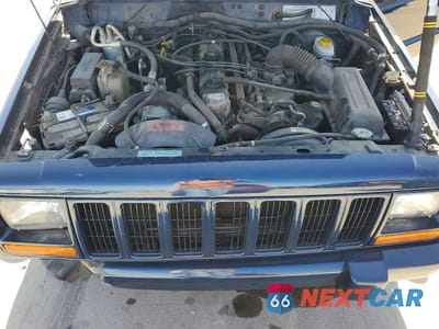 Zdjęcie 11 z 12 samochodu: 2001 JEEP CHEROKEE SPORT VIN:1J4FT48S41L588073 - miniatura