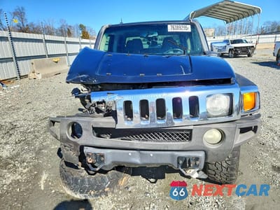 Piąte zdjęcie samochodu w środku: 2009 HUMMER H3T VIN:5GNEN13E598128656 - miniatura