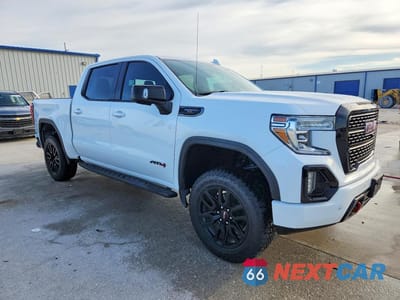 Czwarte zdjęcie samochodu z boku: 2021 GMC SIERRA K1500 AT4 VIN:1GTP9EEL8MZ122997 - miniatura
