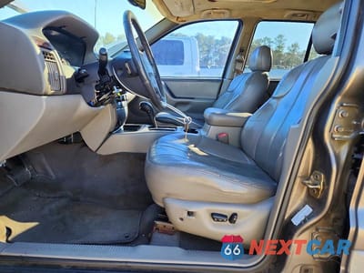 Zdjęcie 7 z 12 samochodu: 2000 JEEP GRAND CHEROKEE LAREDO VIN:1J4G248SXYC344252 - miniatura