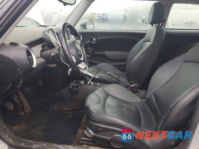 Zdjęcie 7 z 13 samochodu: 2010 MINI COOPER VIN:WMWMF3C5XATZ28128 - miniatura
