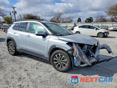 Czwarte zdjęcie samochodu z boku: 2023 TOYOTA COROLLA CROSS LE VIN:7MUFBABG3PV006814 - miniatura