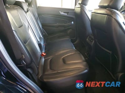 Zdjęcie 11 z 12 samochodu: 2022 FORD EDGE TITANIUM VIN:2FMPK4K98NBA94528 - miniatura