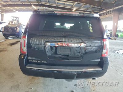 Zdjęcie 6 z 13 samochodu: 2019 GMC YUKON XL DENALI VIN:1GKS2HKJ9KR384970 - miniatura