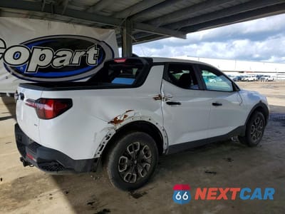 Trzecie zdjęcie samochodu z tyłu: 2022 HYUNDAI SANTA CRUZ SE VIN:5NTJADAE8NH033780 - miniatura
