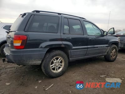 Trzecie zdjęcie samochodu z tyłu: 2003 JEEP GRAND CHEROKEE LAREDO VIN:1J4GW48S53C563004 - miniatura