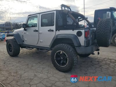 Drugie zdjęcie samochodu z przodu: 2010 JEEP WRANGLER UNLIMITED SPORT VIN:1J4BA3H10AL108004 - miniatura