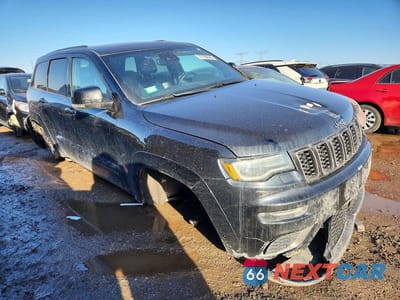 Czwarte zdjęcie samochodu z boku: 2018 JEEP GRAND CHEROKEE OVERLAND VIN:1C4RJFCG2JC227321 - miniatura